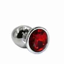 Анальная пробка Kanikule Small, серебристая с красным кристаллом. Нет в наличии Анальная пробка Kanikule Small, серебристая с красным кристаллом