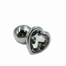 Анальная пробка Kanikule Medium, серебристая с бесцветным кристаллом сердце. Нет в наличии Анальная пробка Kanikule Medium, серебристая с бесцветным кристаллом сердце